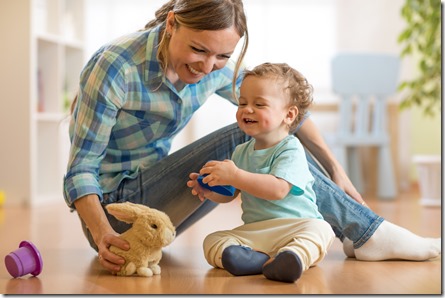 Mother plaing with her son baby